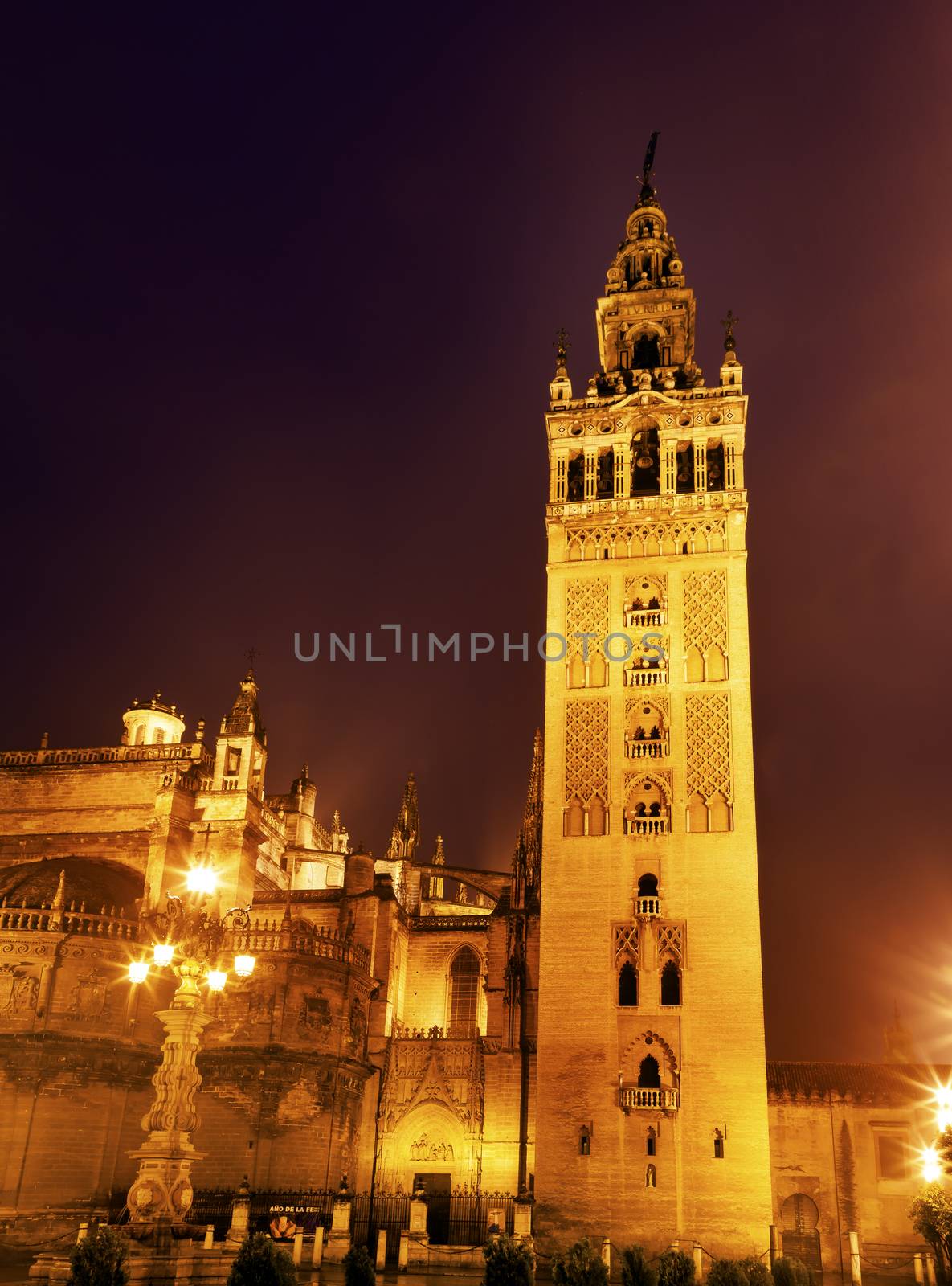 Giralda Bell Tower Seville Cathedral Rainy Night Spain by bill_perry