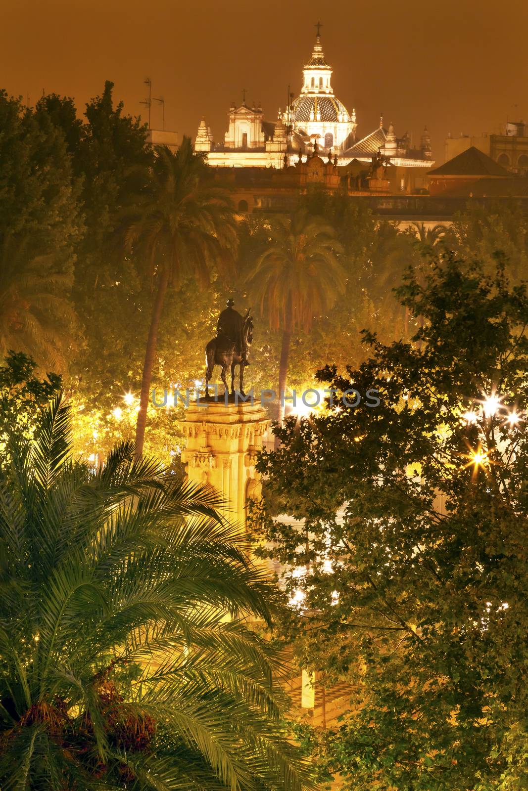 Plaza Nueva Ferdinand Statue Rainy Night Church El Salvador Seville Andalusia Spain.