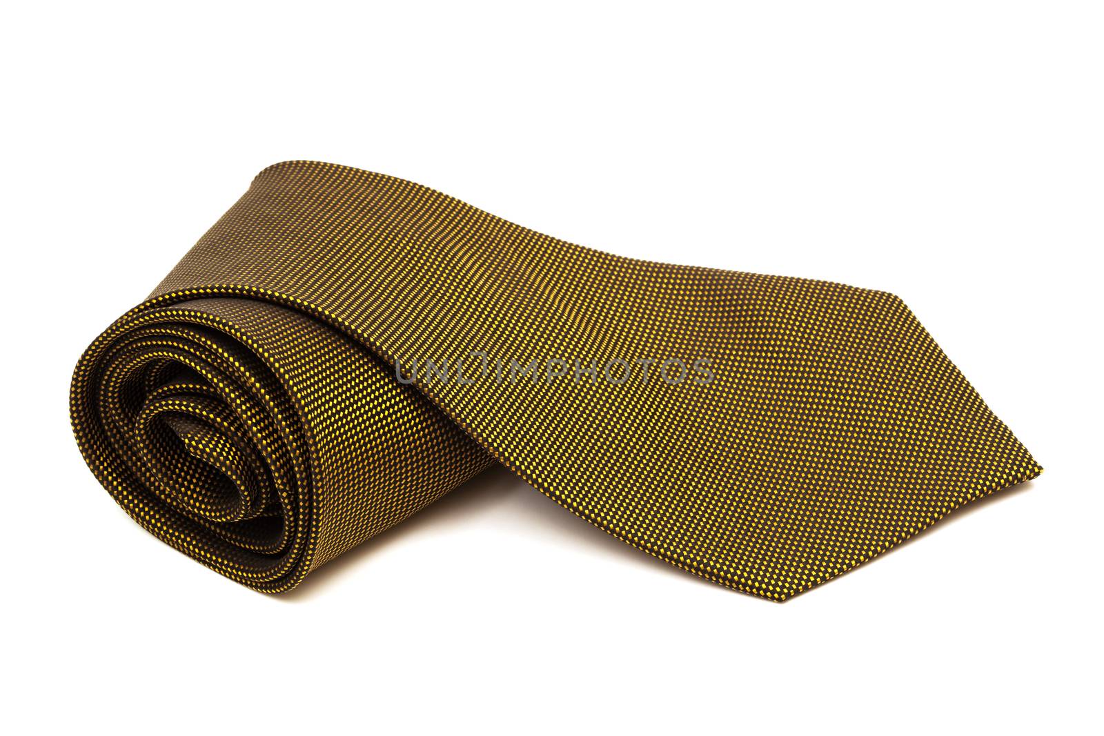 Fashionable gold necktie on a white background