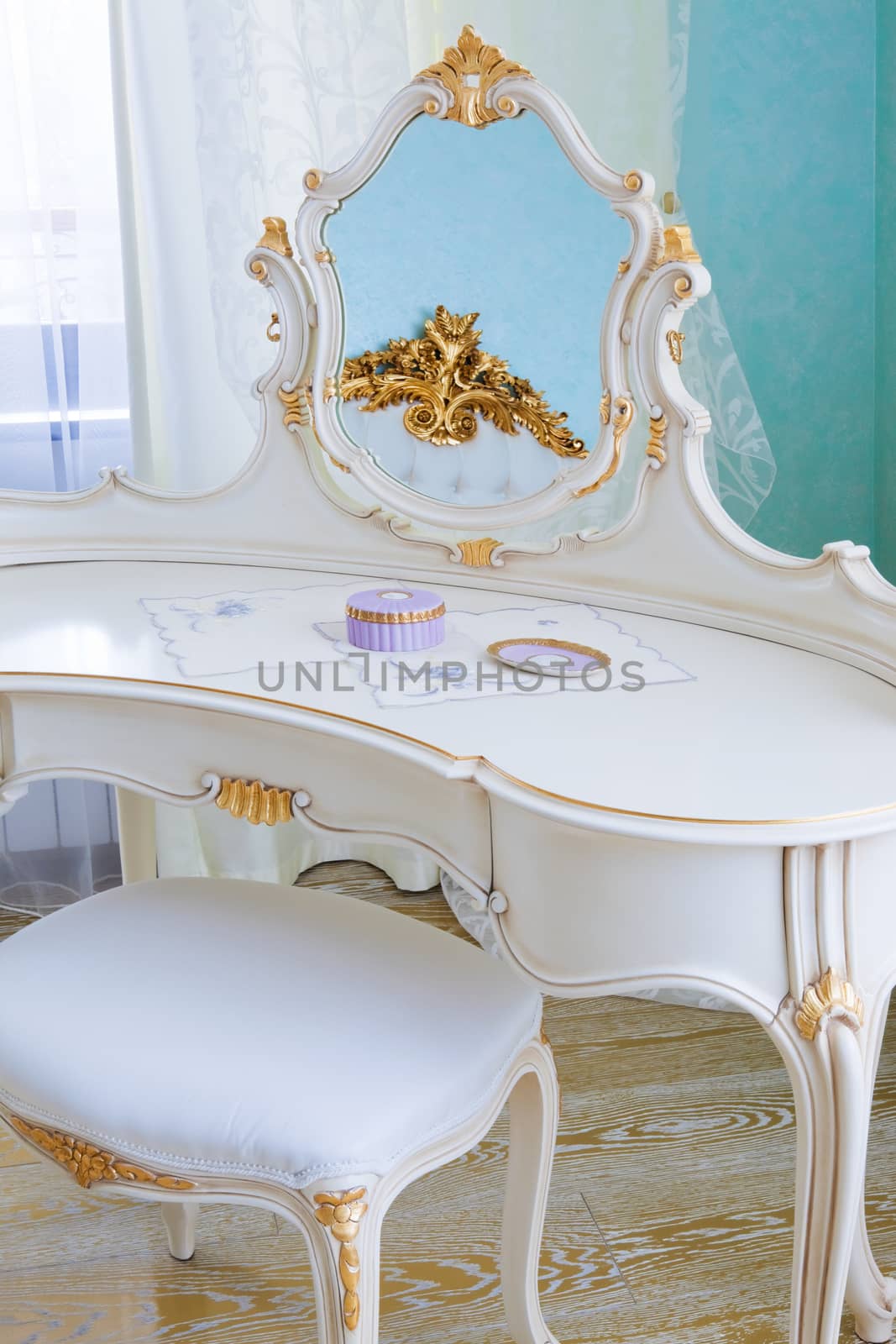 white dressing table in a modern bedroom