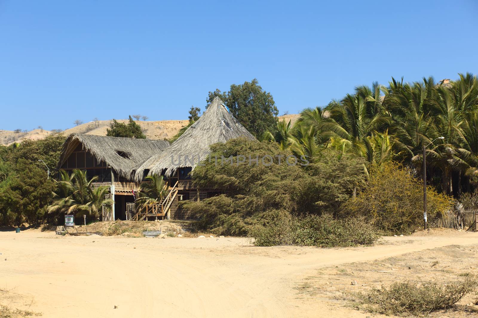 MANCORA, PERU - AUGUST 17, 2013: The hotel La Posada on August 17, 2013 in Mancora, Peru. Mancora is a popular Peruvian beach town where many hotels and hostels await the tourists.