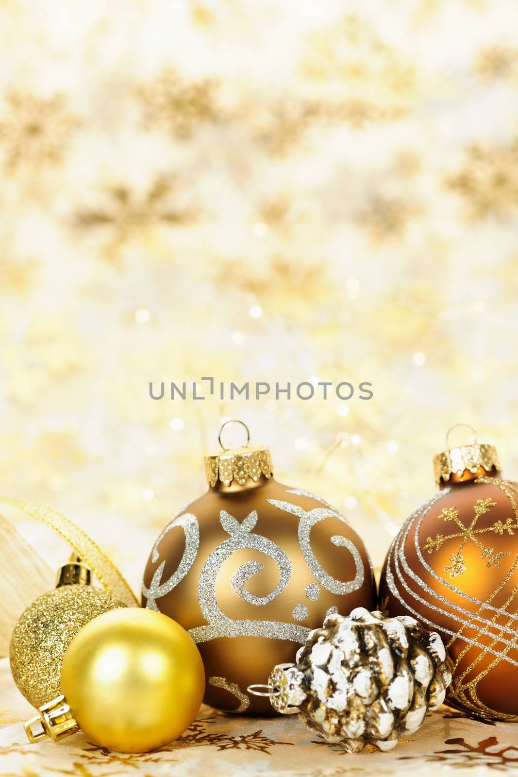 Golden Christmas ornaments background by elenathewise