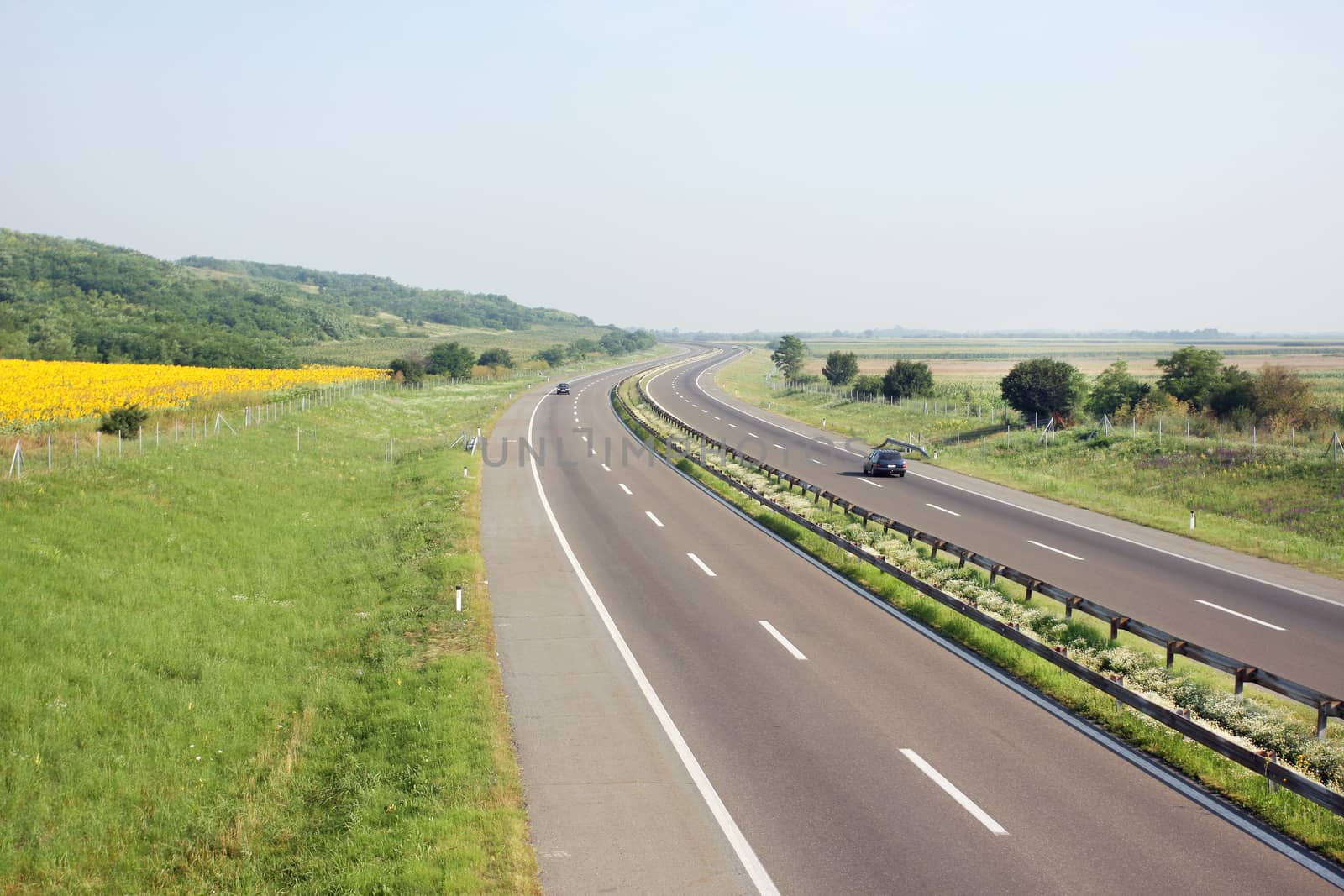 highway at sunny day classic scene of a highway in rural area