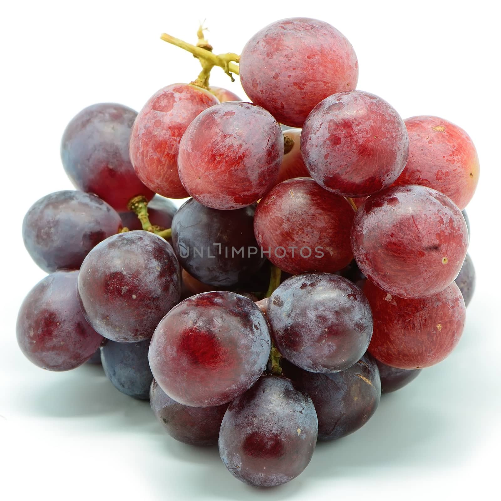 Delicious ripe grapes isolated on a white background