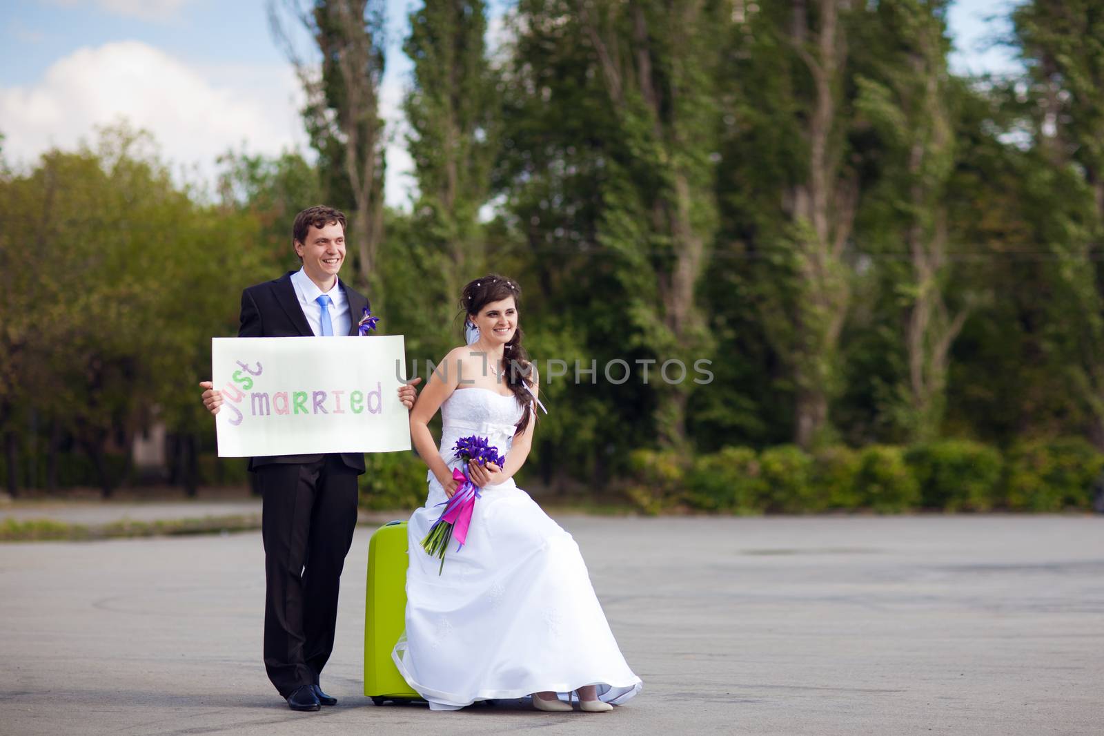 couple with blank "just married" by vsurkov