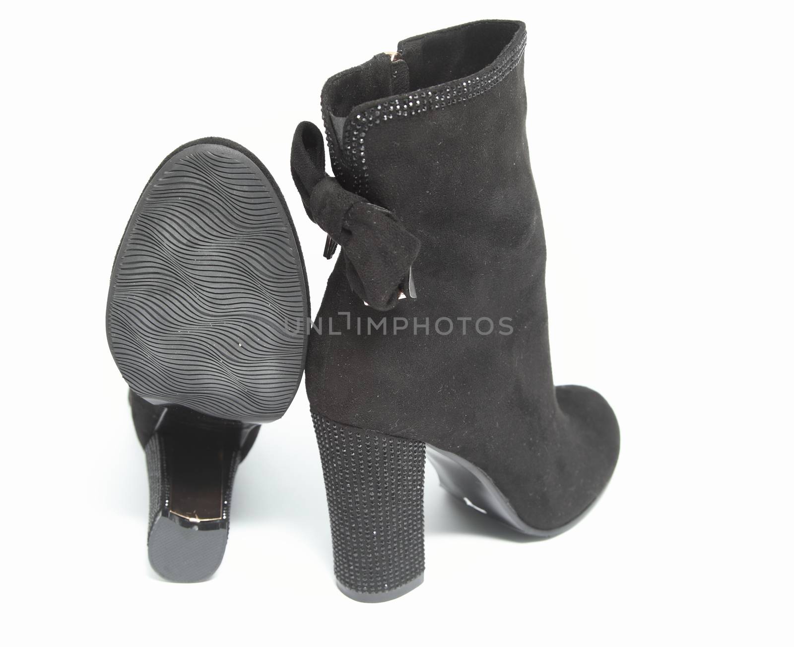 Modern fashionable women winter boot shot in studio