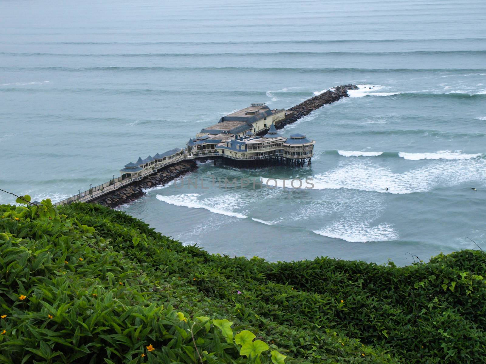 Pier in Pacific Ocean by pyty