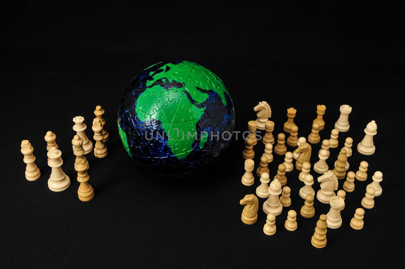 Globe And White Chess on a Black Background