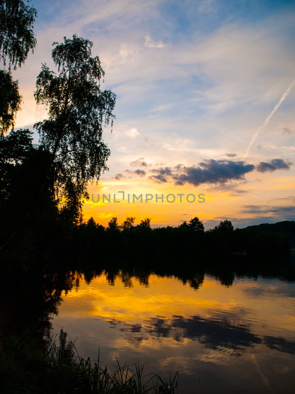 Komarov lake near Brandzes after sunset by pyty
