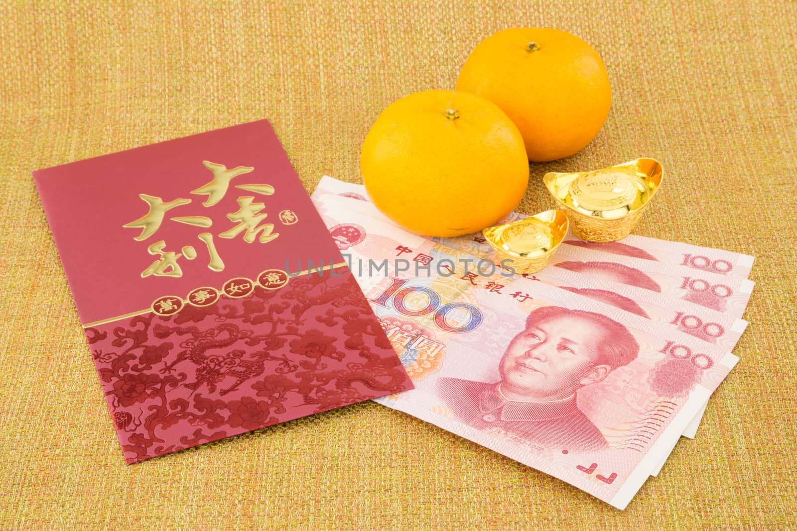 chinese new year with decoration, money yuan banknote, ingot and orange, celebrate chinese new year festival and asian culture