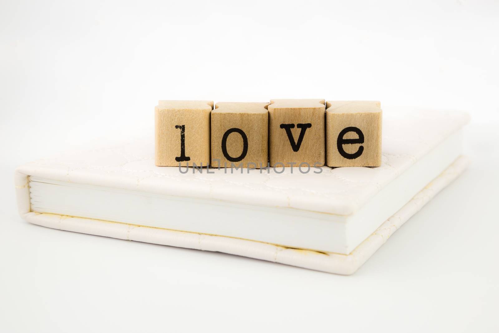 love wording stack on a book by vinnstock