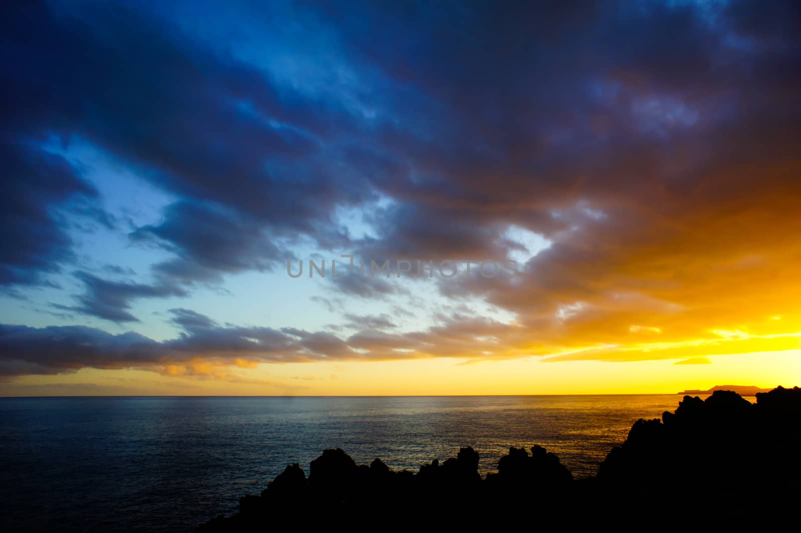 Cloudscape, Colored Clouds at Sunset near the Ocean