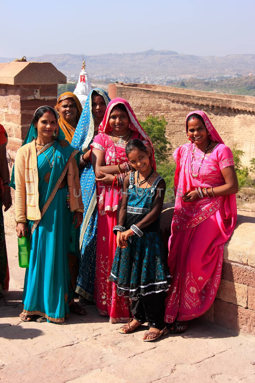 Indian women standing at Mehrangarh Fort, Jodhpur, India by donya_nedomam