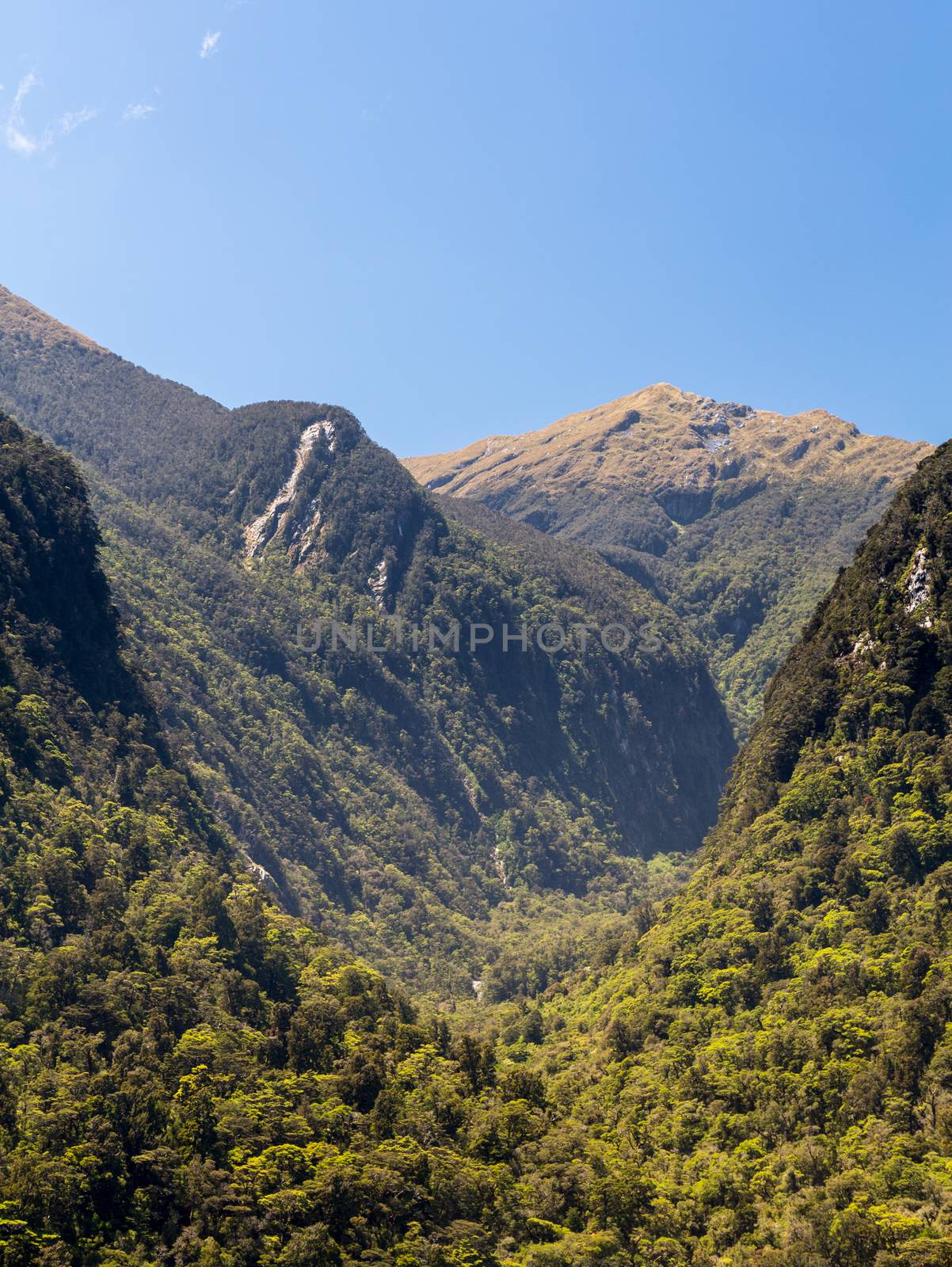 Rock formation in Doubtful Sound on South Island of New Zealand with an interesting layered depth from the receding hills