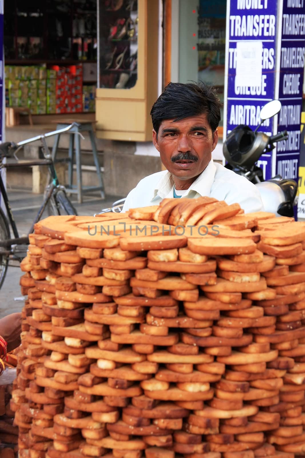 Indian man selling bread, Sadar Market, Jodhpur, Rajasthan, India