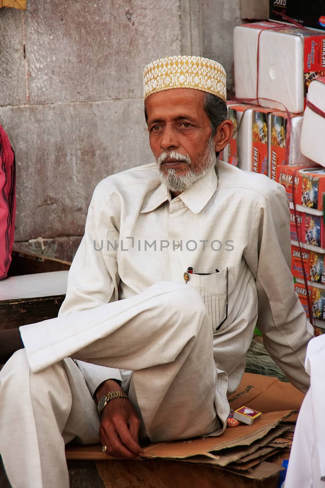 Indian man sitting at Sadar Market, Jodhpur, India by donya_nedomam