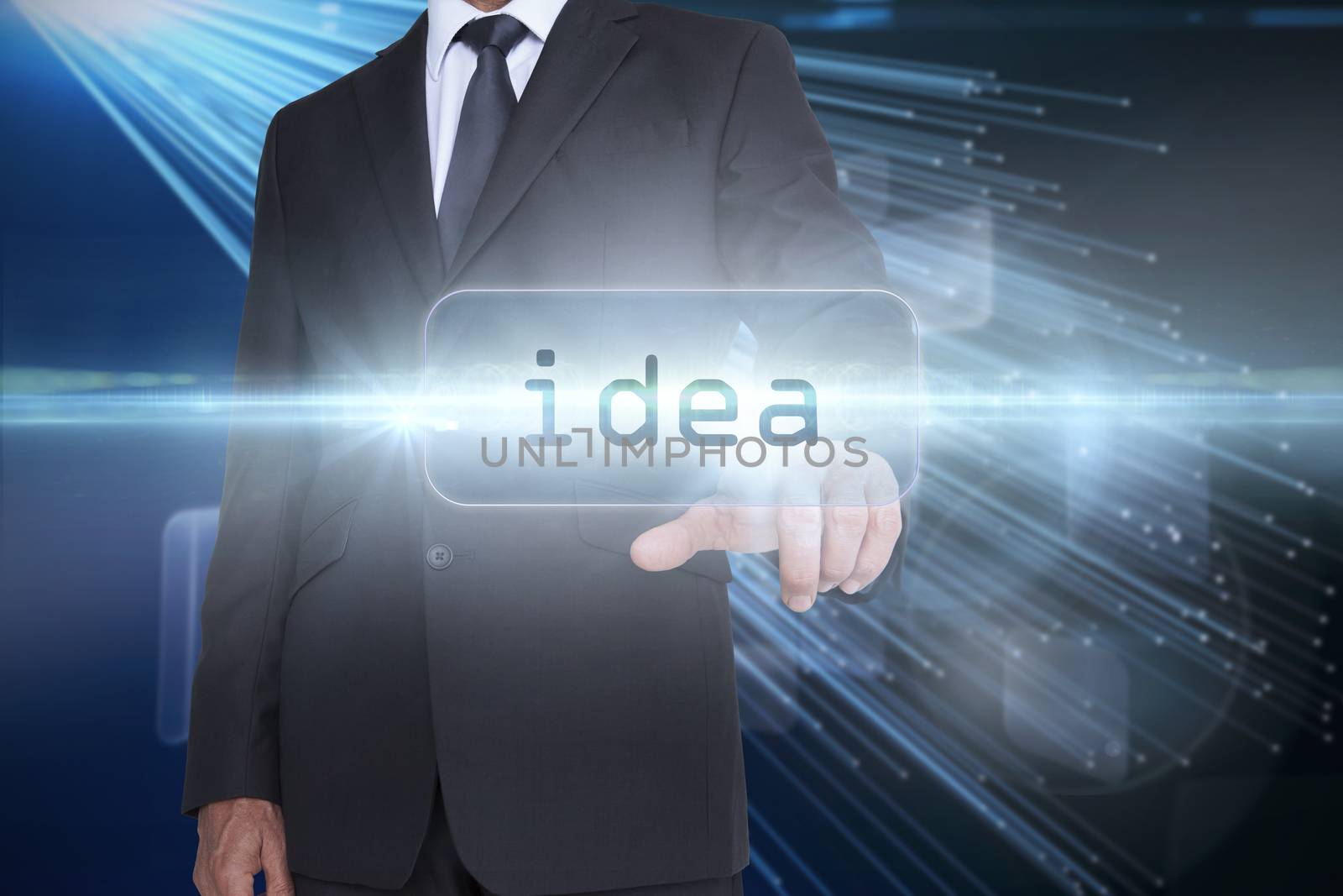 The word idea and businessman pointing against abstract technology background