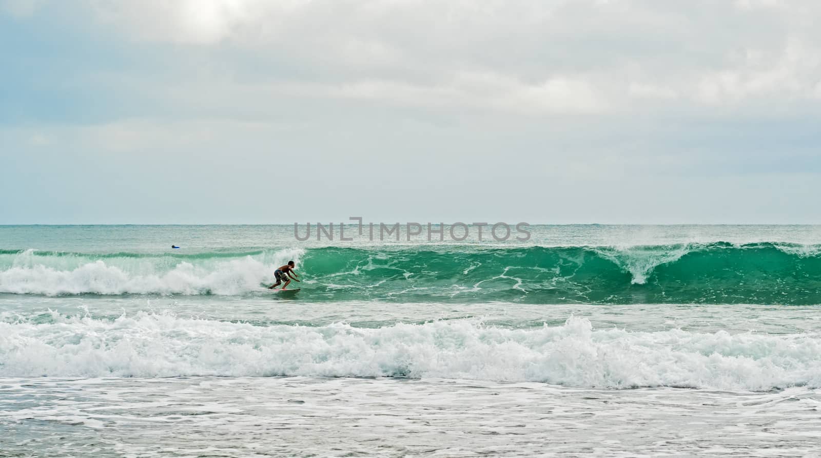 surfing in Crribean sea in Bocas del Toro January 6, 2014