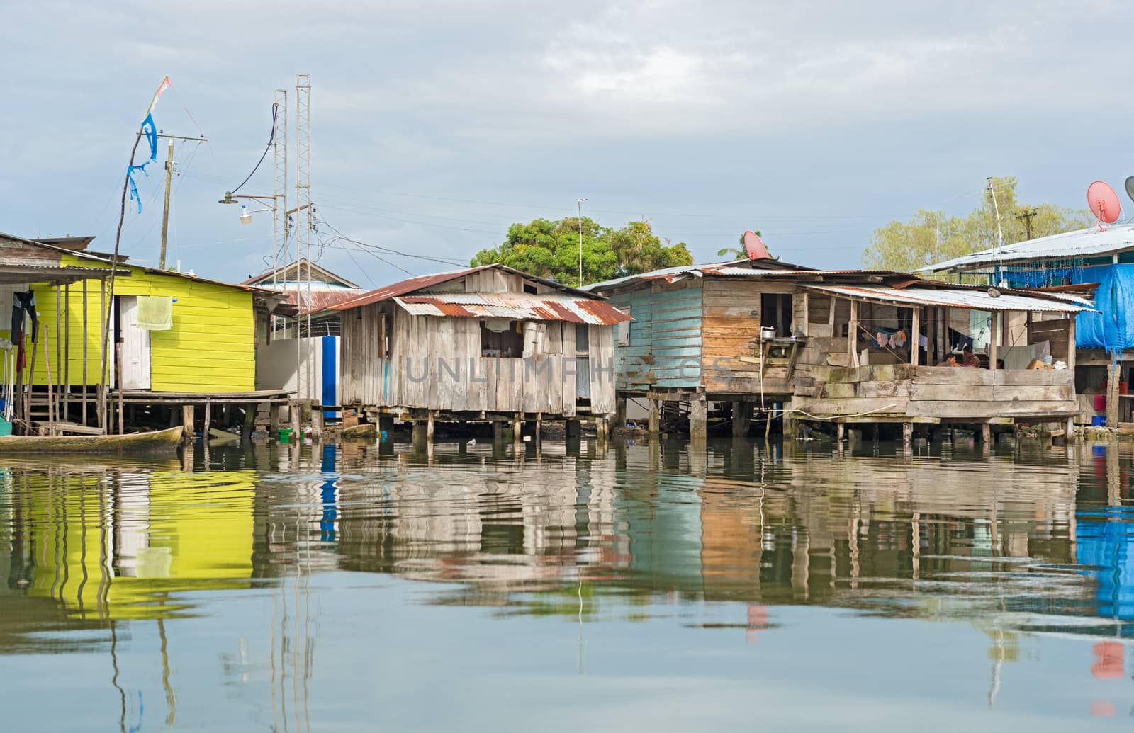 Houses on the water in Almirante, Panama by Marcus