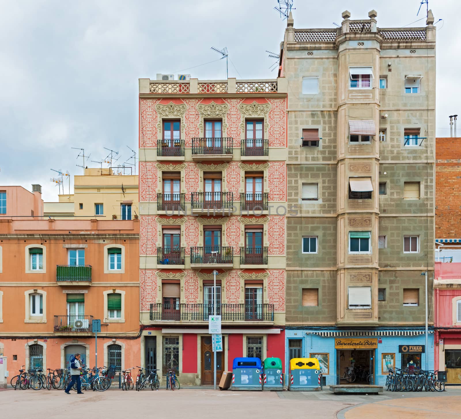 Facade of the old houses in Barcelona, Spain by Marcus