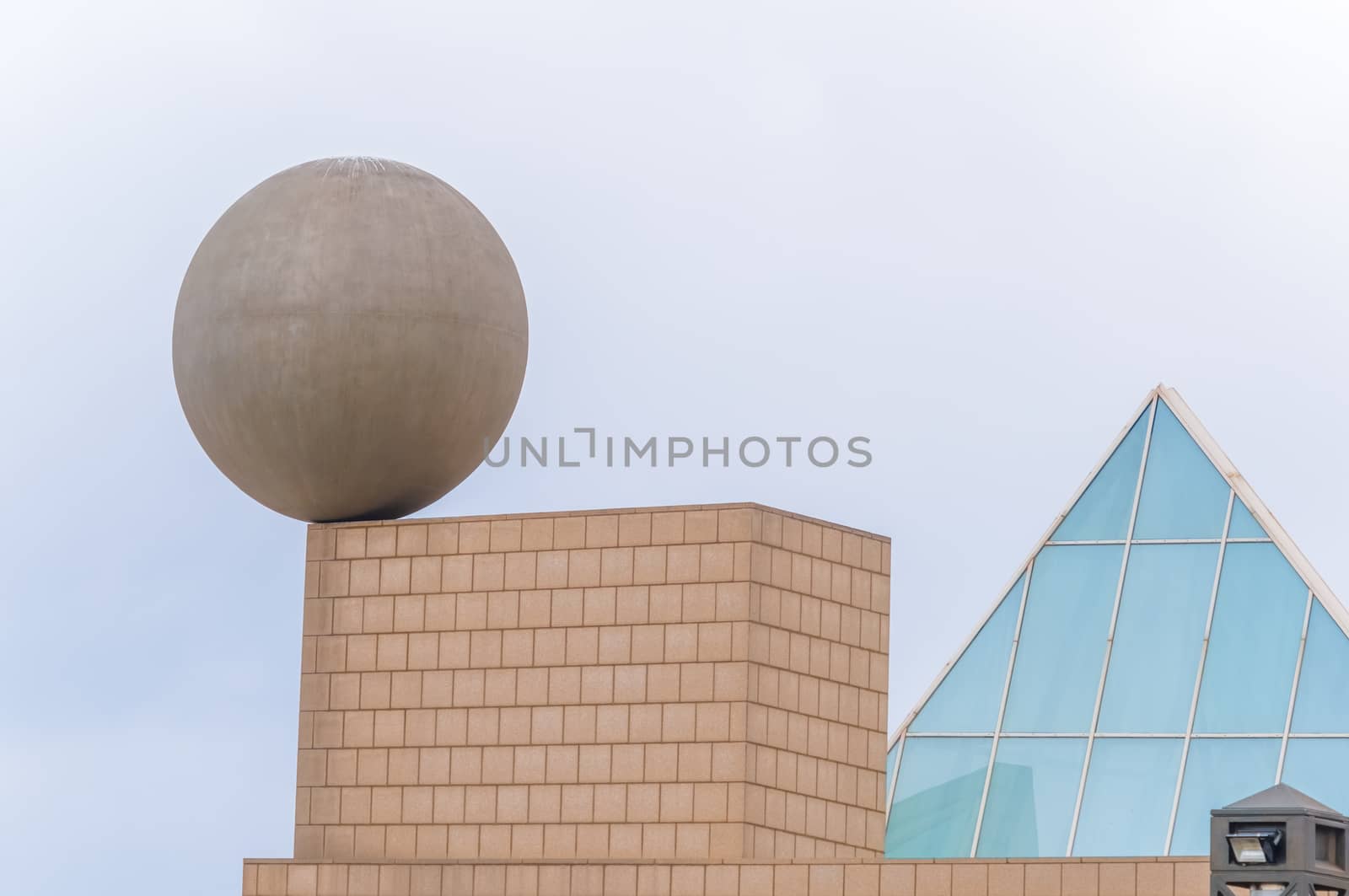 Barcelona, Spain - January 25, 2014: Detail of the Port Olimpic  Village in Barcelona with the big sphere sculpture designed by the famous architect Frank Gehry and erected in 1992. Spain. 