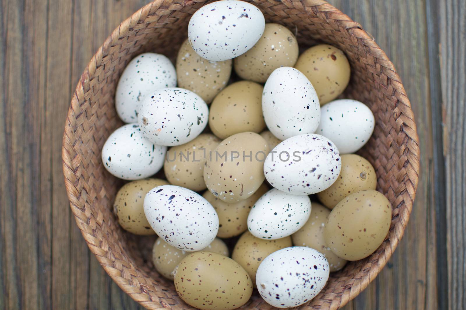 Easter eggs inside a wicker basket 