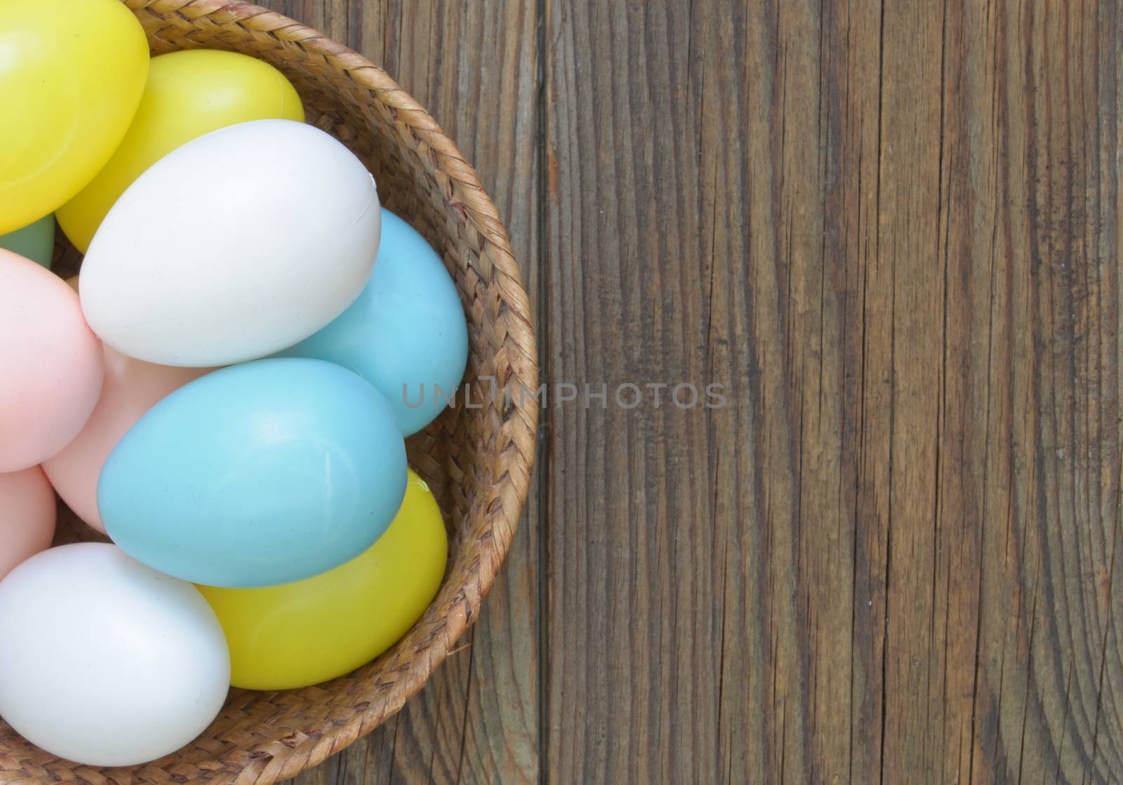 Easter eggs inside a wicker basket 