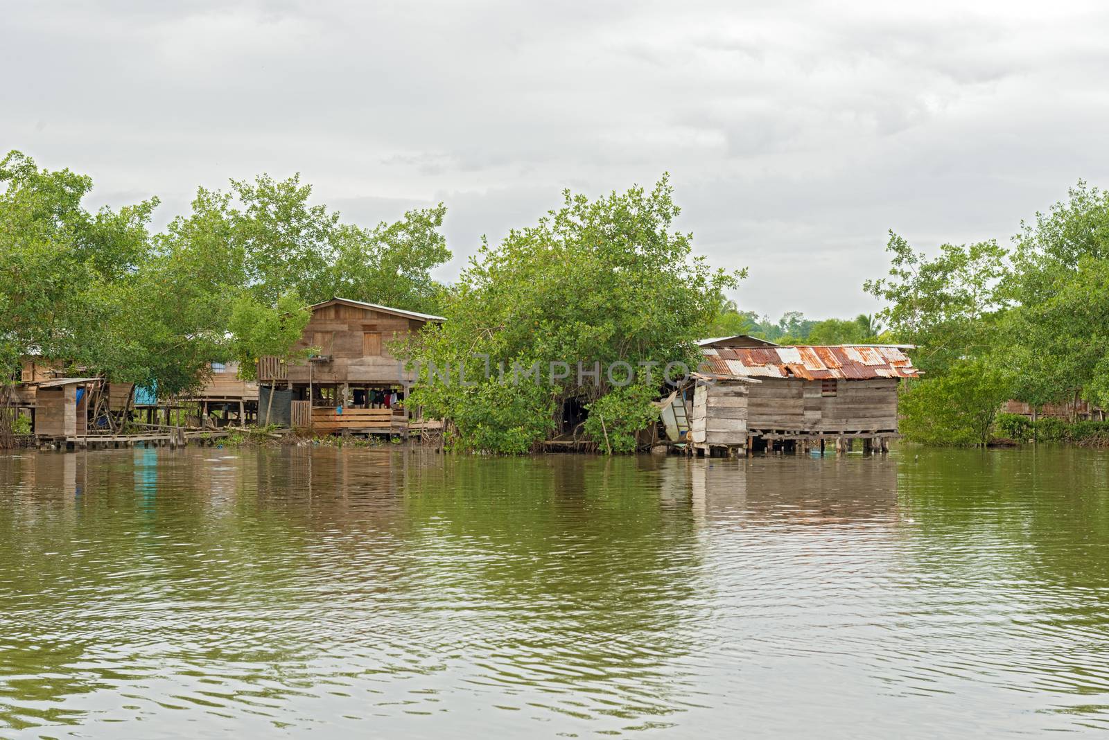 Houses on the water in Almirante, Panama by Marcus