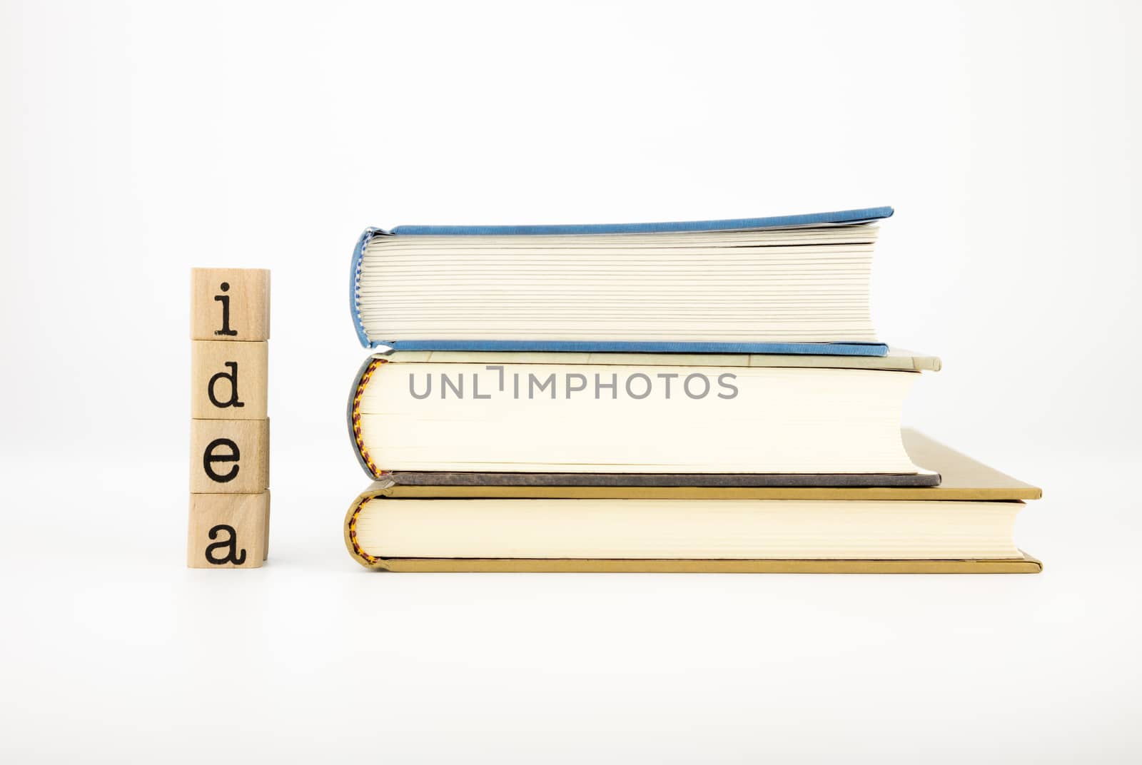 closeup idea  wording and books isolate on white background, concept and idea for education and business