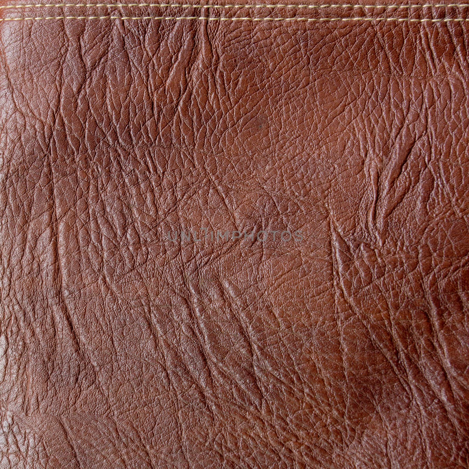 Texture of brown leather  by wyoosumran