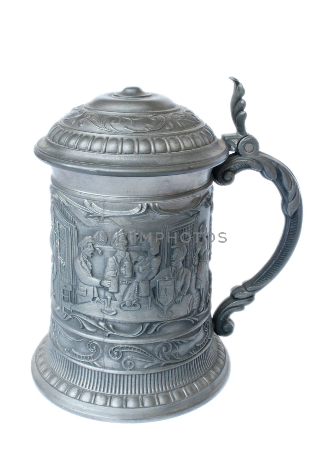 Antique German pewter beer stein with engraving.