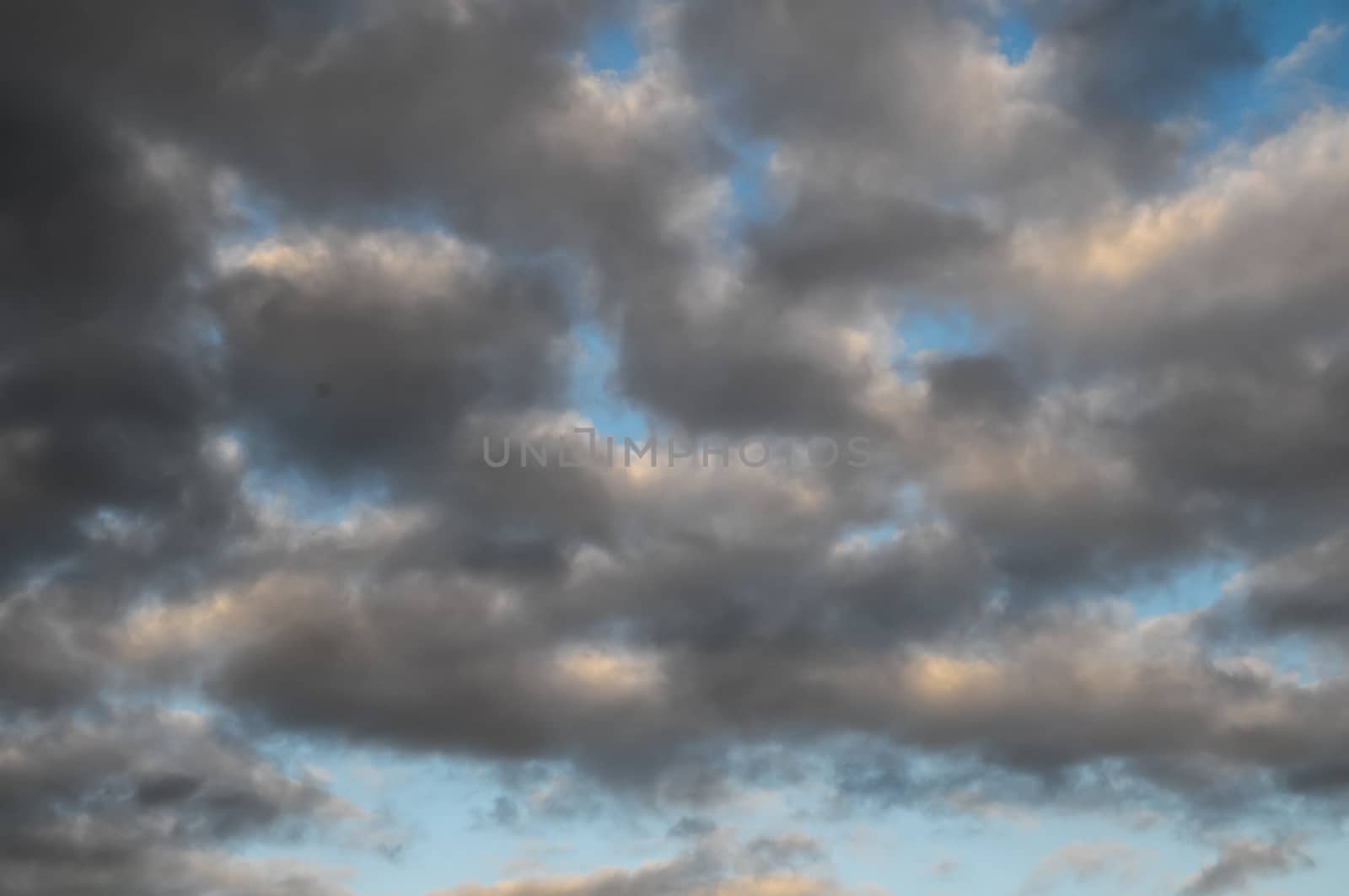 Cloudscape, Colored Clouds at Sunset near the Ocean