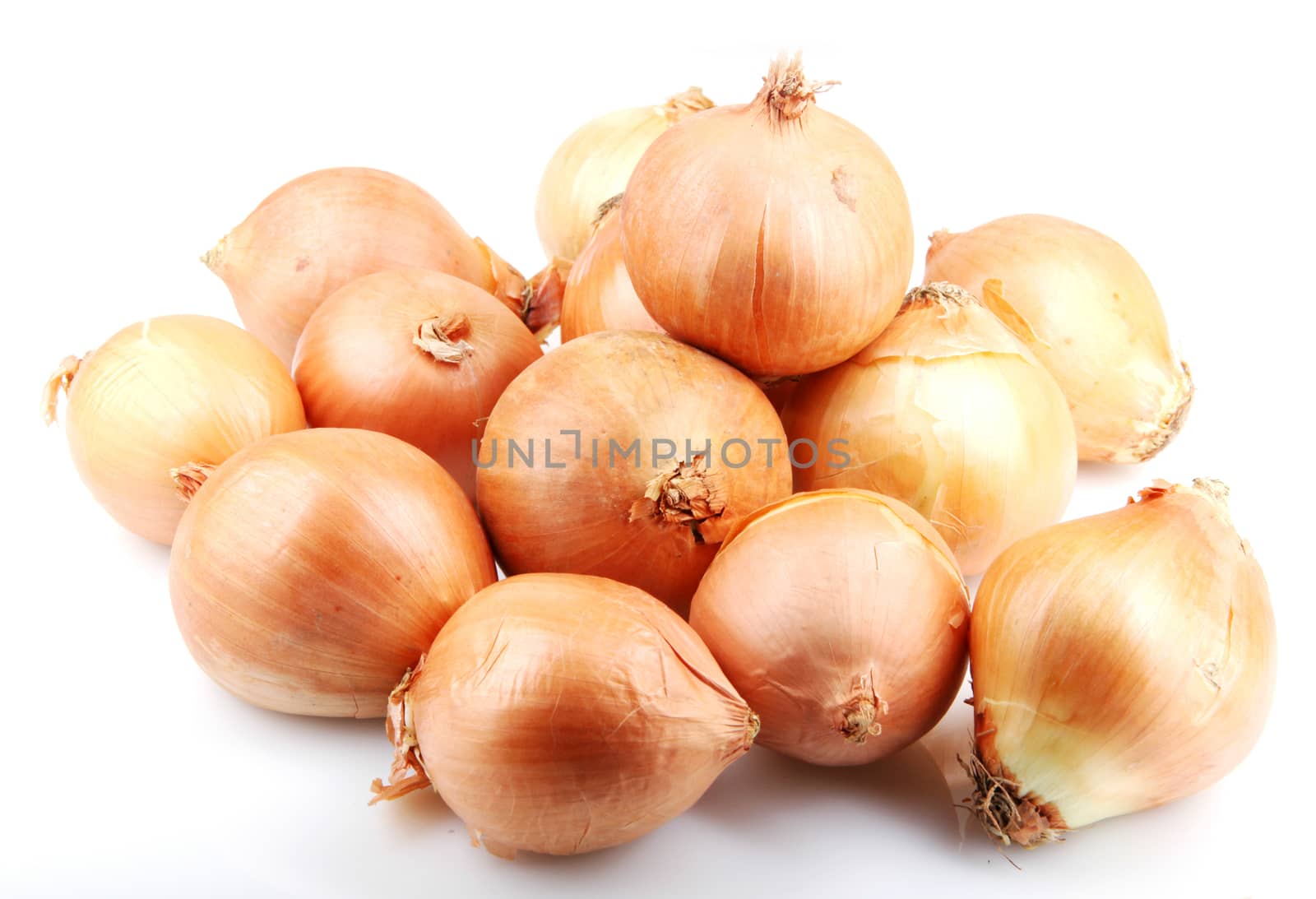 Fresh onion bulbs isolated on white background