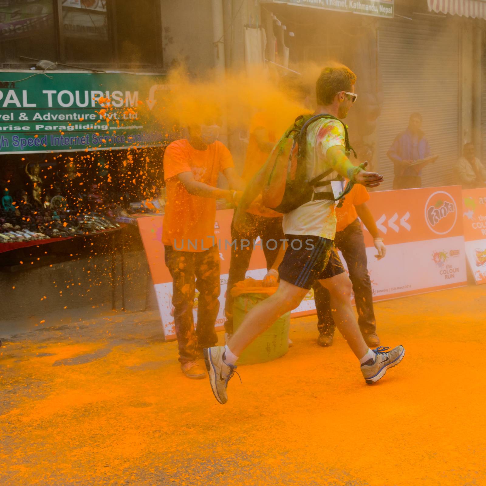 KATHMANDU, NEPAL - MARCH 15, 2014: The Colour Run is part of the Holi Festival celebrations.