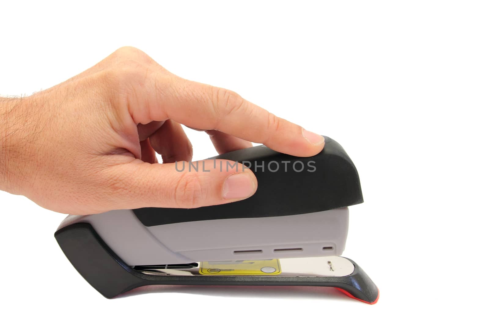 image of man hand using a stapler over white