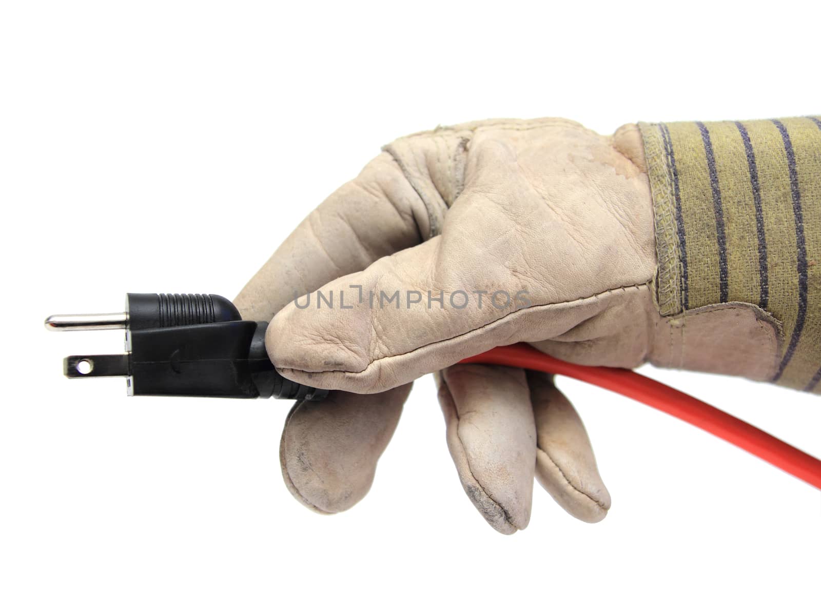 closeup of a hand with glove holding an electric wire