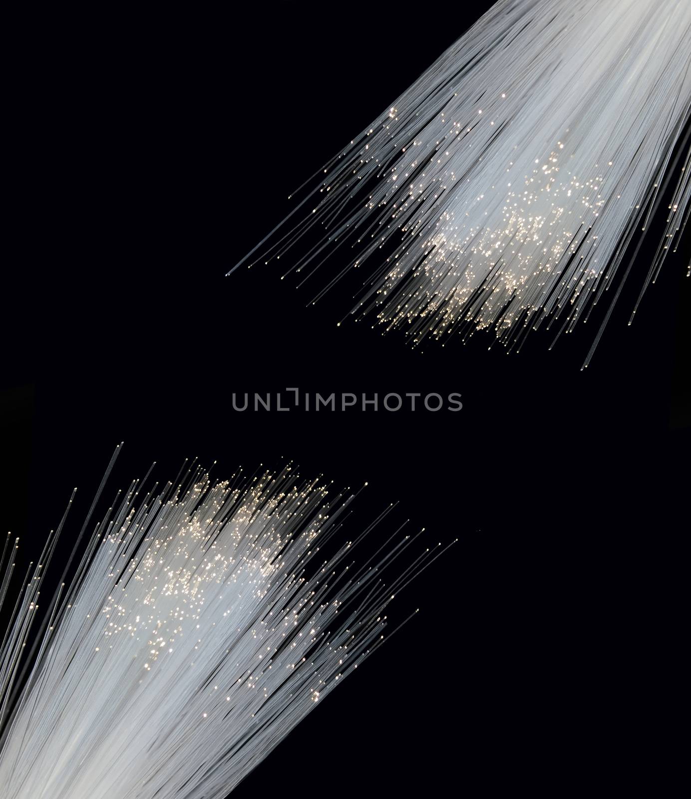broken optical fiber isolated on black background