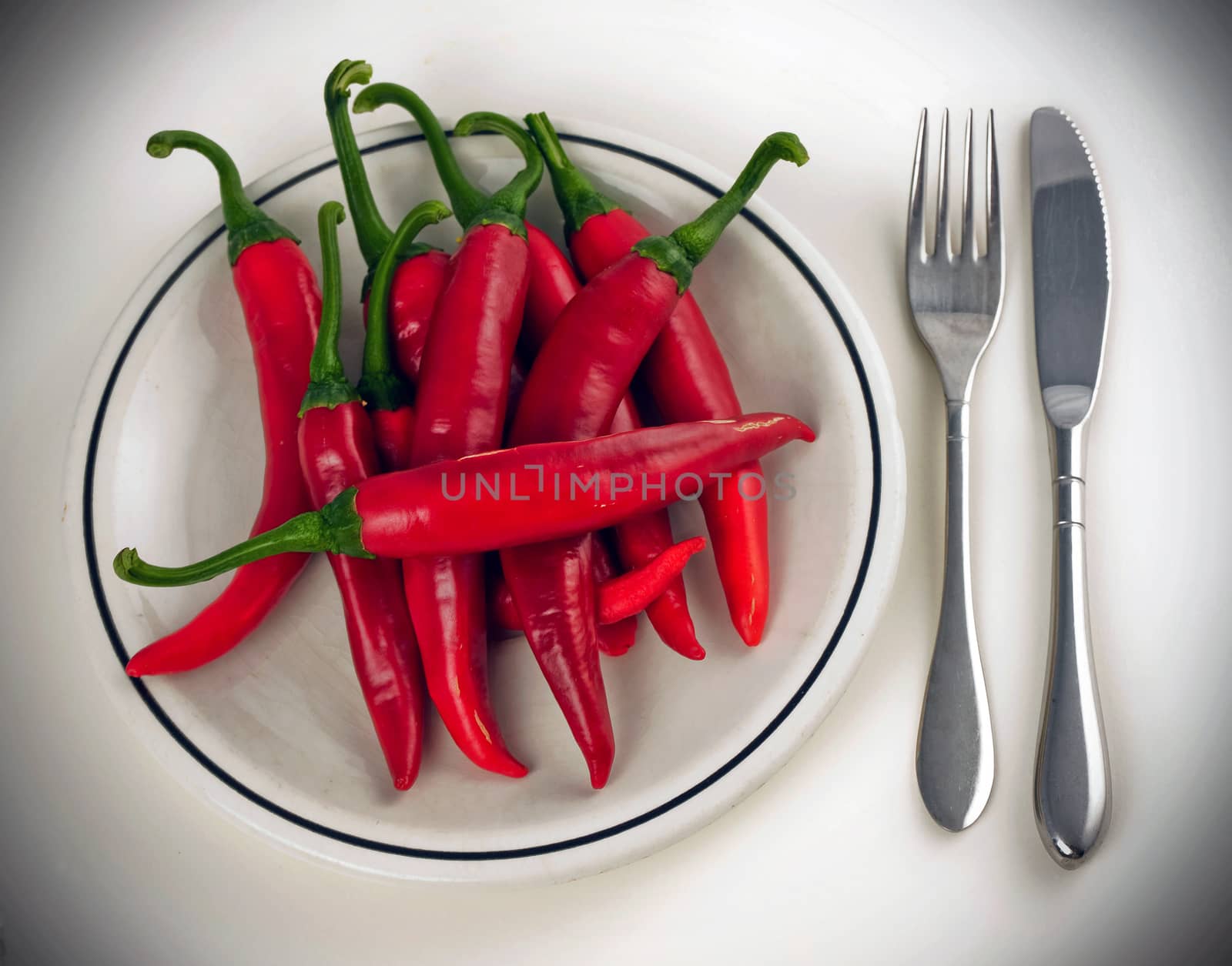 red pepper dish with cutlery