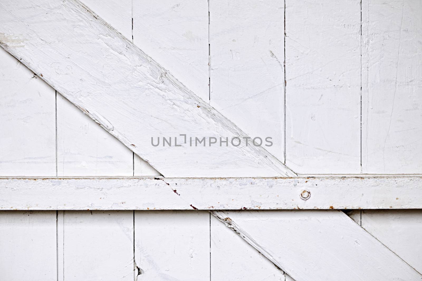 Background of old wooden barn door painted white