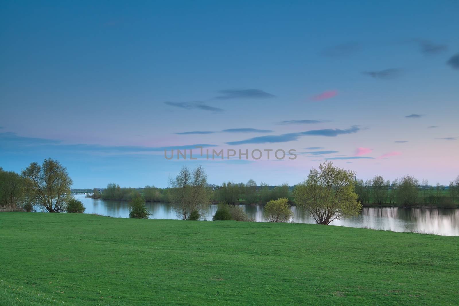 calm sunset over river, Gelderland, Netherlands