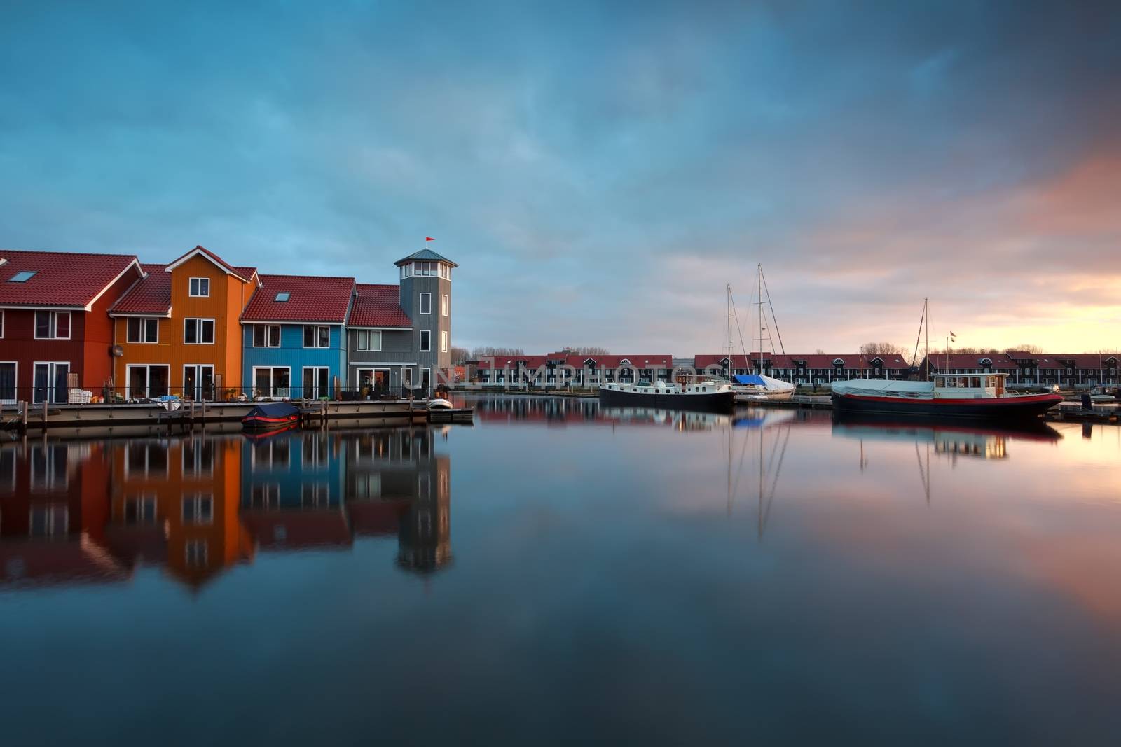 sunrise over marina with buildings and boats, Groningen, Netherlands