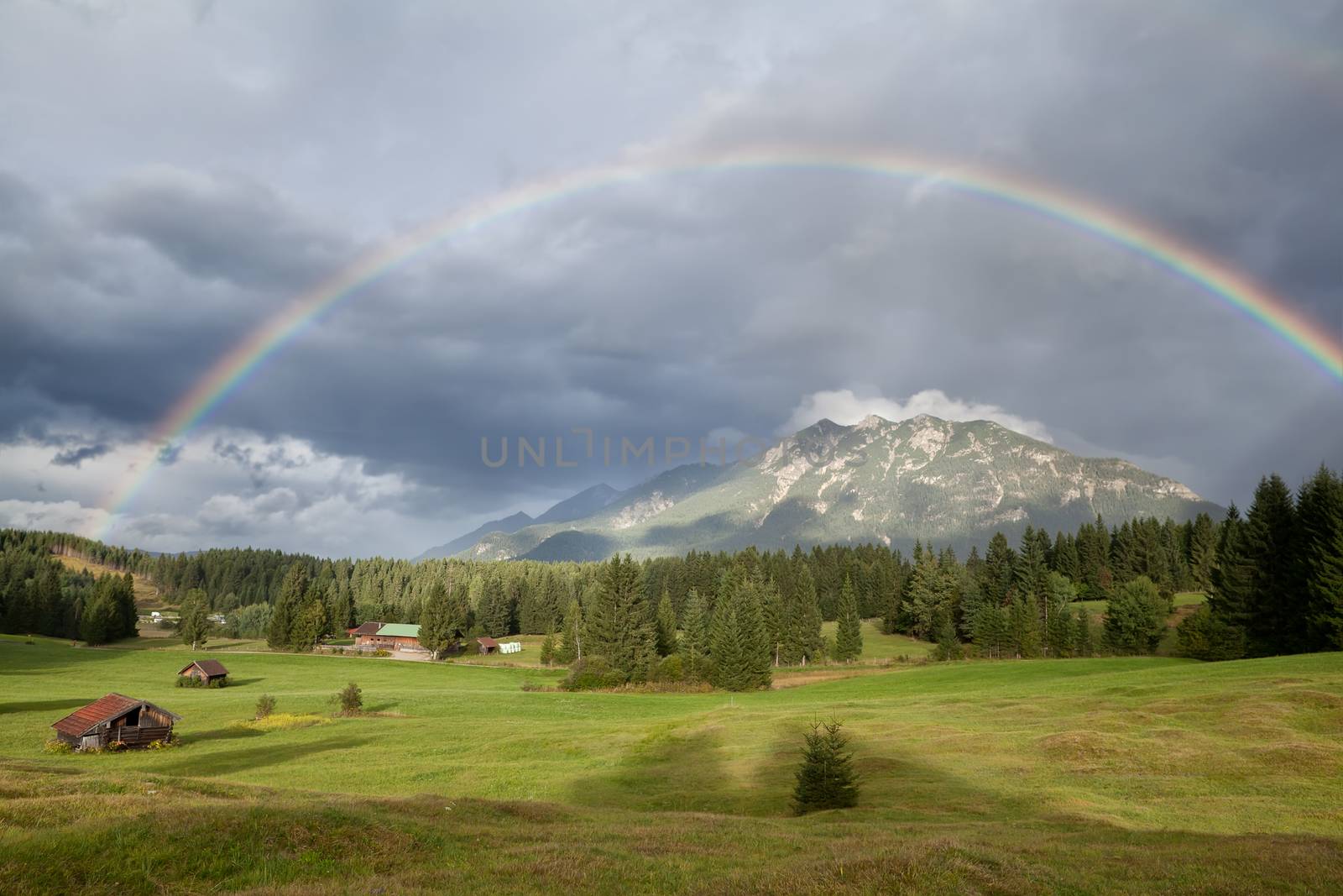rainbow over Bavarian Alps by catolla