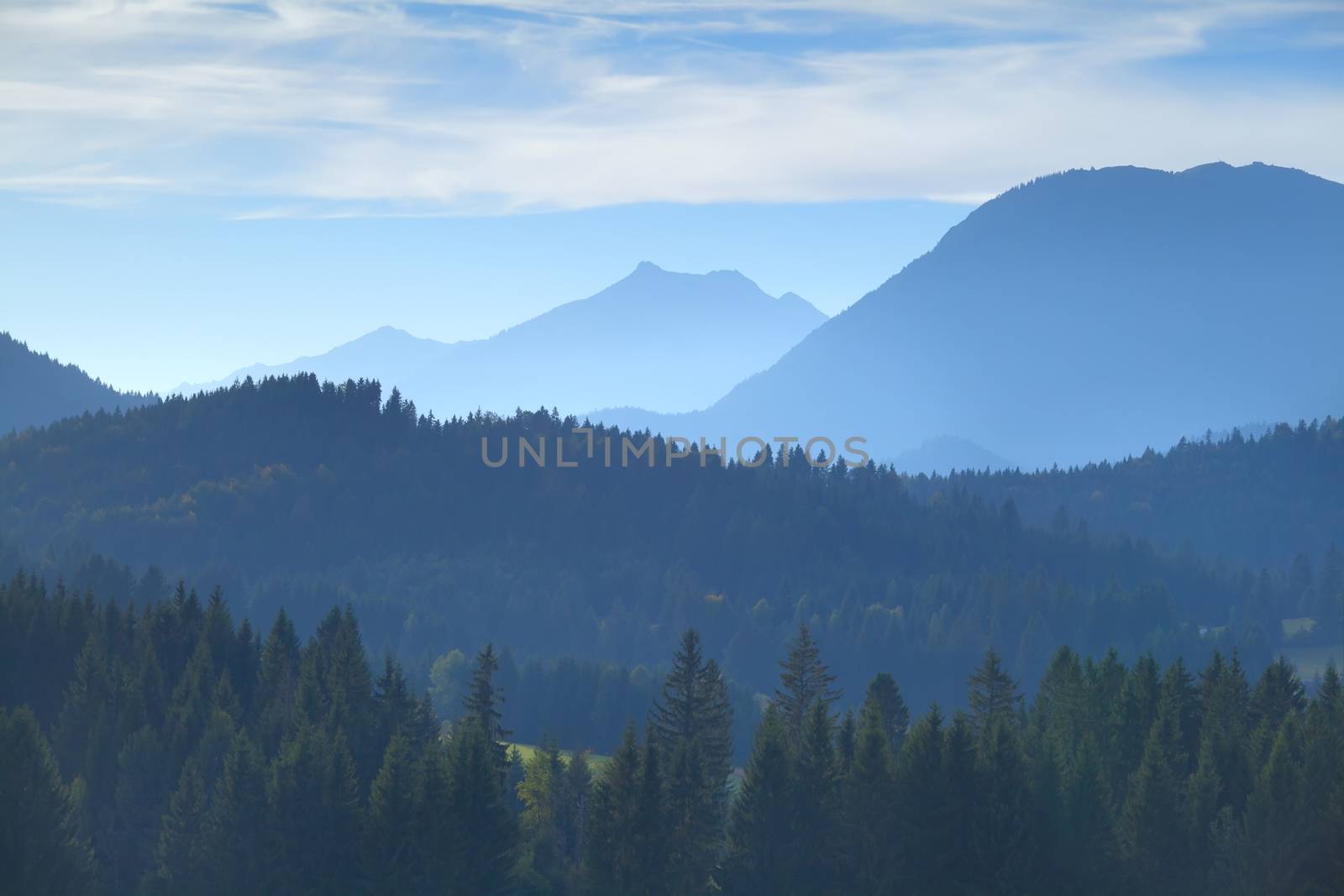 Karwendel mountain range in misty fog by catolla