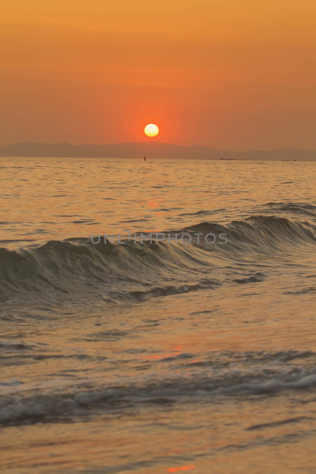 Beautiful sunset with the sea in Thailand 