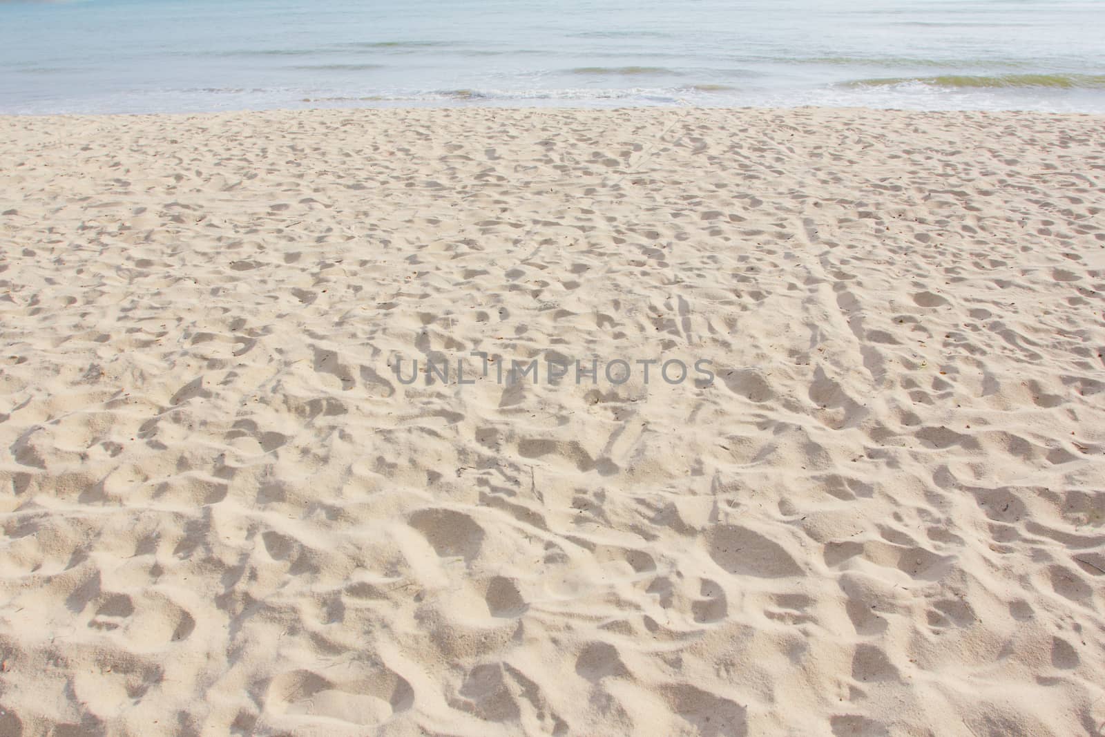 Beach and tropical sea  by wyoosumran