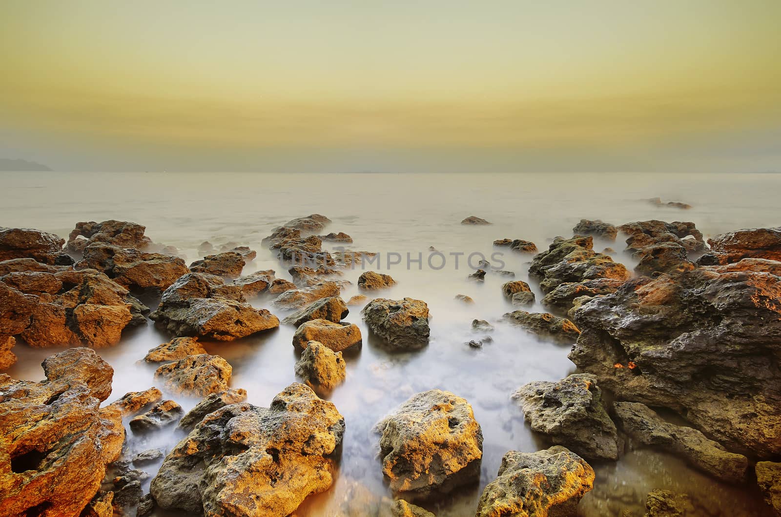 View of a tropical Sea and rocks. Long exposure shot.