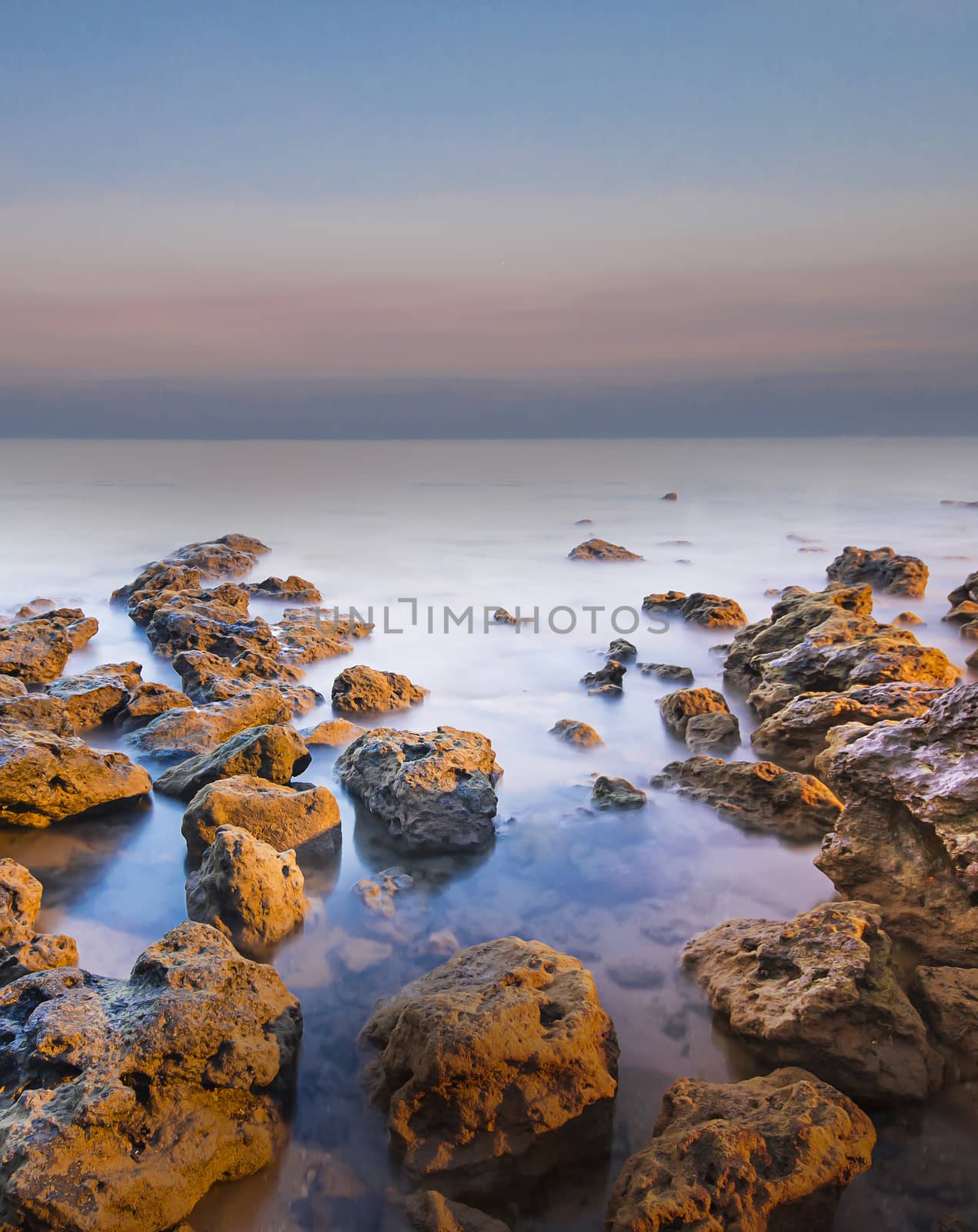 View of a winter Sea and rocks. Long exposure shot.