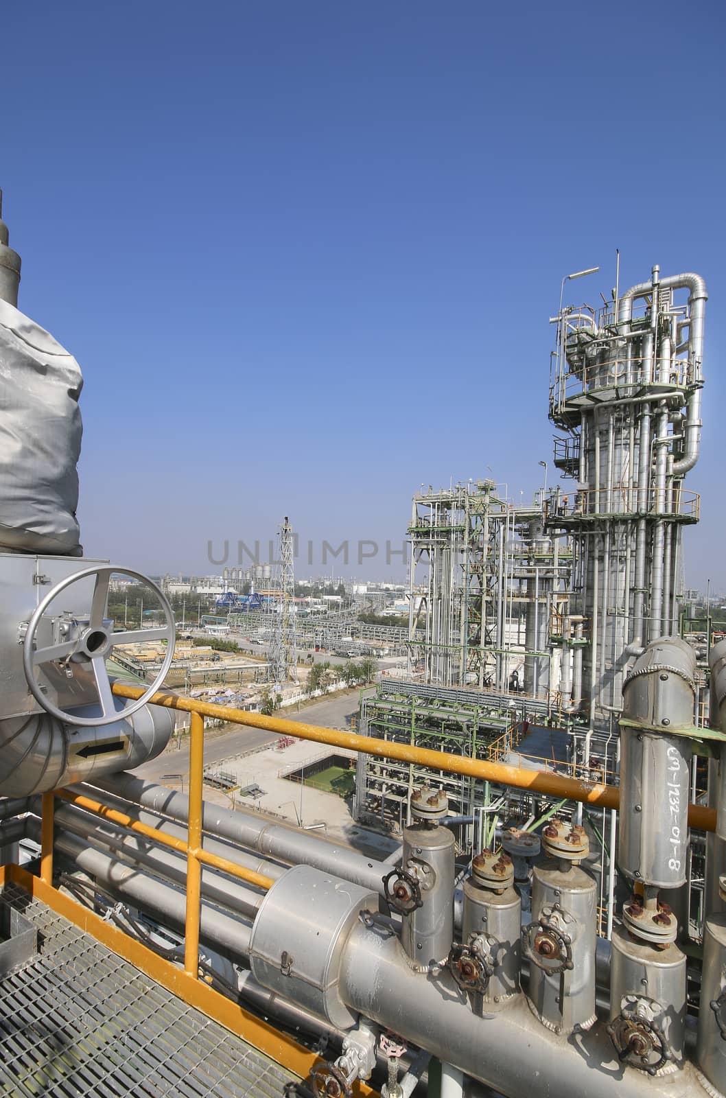 Oil and chemical industrial plant with blue sky in winter season
