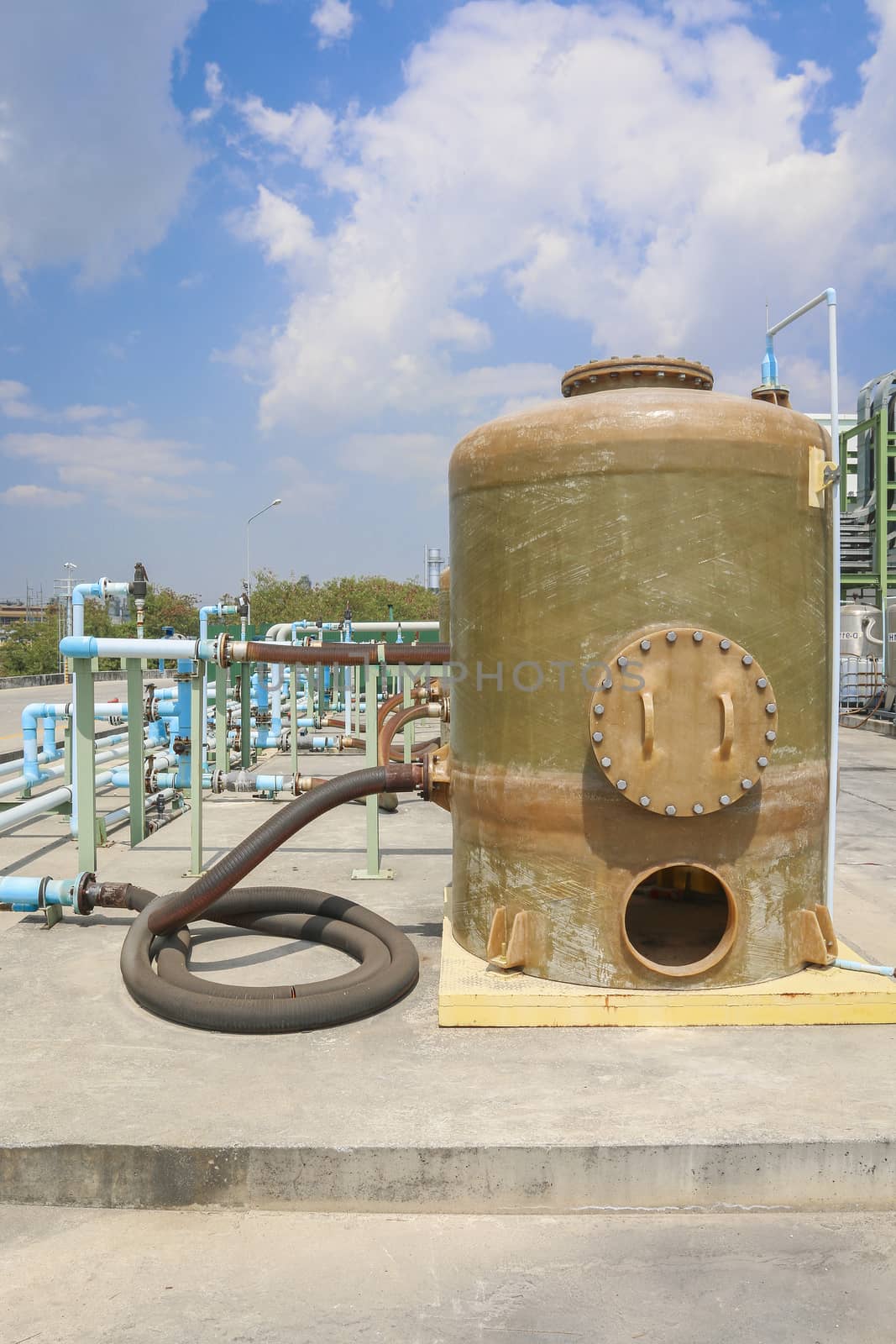 Chemical tank storage with PVC pipe line in factory