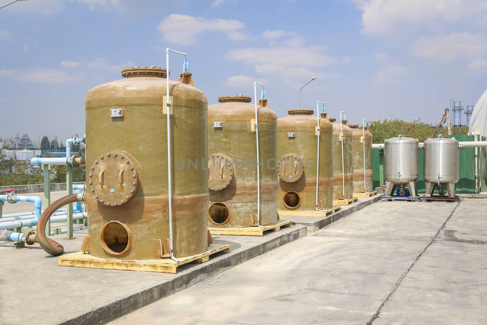 Chemical tank storage with PVC pipe line in factory